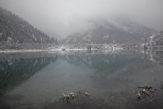The first snow falls over lake Issyk, near Almaty Kazakhstan. 