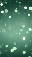 Beautiful luxury gold bokeh on defocused emerald sage green background.