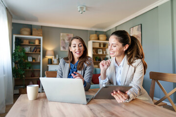 Caucasian Businesswomen Engaged in Remote Work