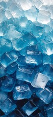 Bright Blue Ice Cubes Piled Together, Creating a Cool Texture and Shimmering Appearance