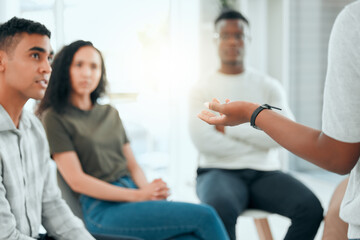 Fototapeta premium Discussion, hands and group of people in counseling for mental health support, share story or recovery. Therapy, listen or rehabilitation for trauma, addiction or meeting for wellness, advice or help