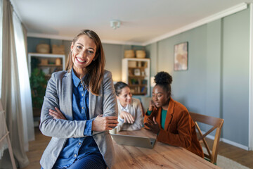 Obraz premium Smiling Businesswoman with Digital Tablet in Home Office