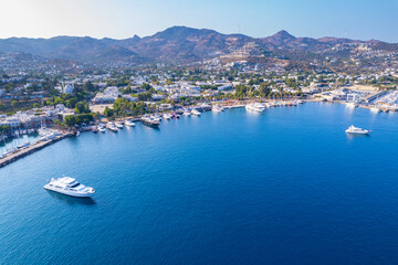 Yalikavak Bay of Bodrum. Mugla, Turkey. Panoramic view of Yalikavak marina and beach. Drone shot.