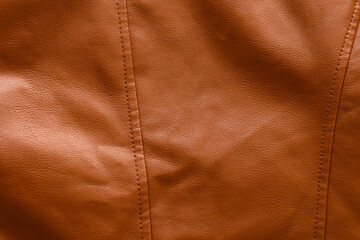 Brown leather fabric material background