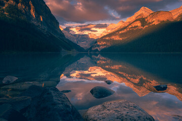 Morning sun grows over the mountains and glaciers of Lake Louise of Banff National Park
