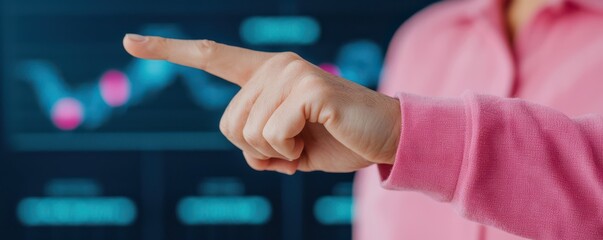 A hand pointing at a digital display, illustrating data analysis and business insights on a tech background.