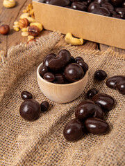 Nuts in chocolate. Healthy and natural sweets