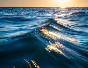 A close-up of ocean waves rippling across the surface, capturing the smooth yet textured mov