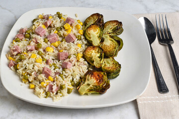rice  with diced spam, corn and peas  with brussel sprouts,