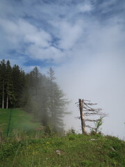mountains in the clouds in the Austrian Alps