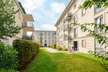 Residential area with ecological and sustainable green residential buildings, low-energy houses with apartments and green courtyard