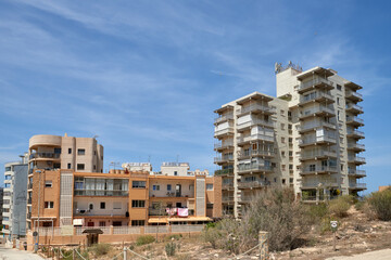 Eerie Landscapes of Spain's Housing Bust: Incomplete Developments and Desolate Neighborhoods Under Vast Skies. Remnants of Spain's Economic Downturn: Unoccupied Homes and Barren Skylines in