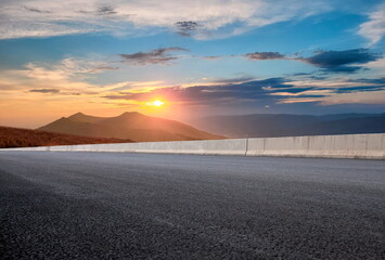 sunset over the mountain road landscape outdoor travel horizon © skandar