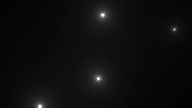 Photographer camera flashes. Random bright blinking lights. Flashing lens flares. Seamless loop