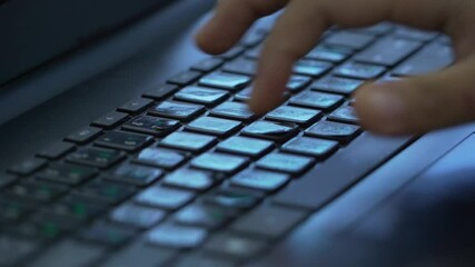 typing on laptop's keyboard 