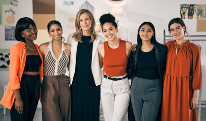 Happy women, portrait and fashion designer with confidence for career, job or clothing production. Group, diversity and female person with styling team or hug in unity for small business or agency