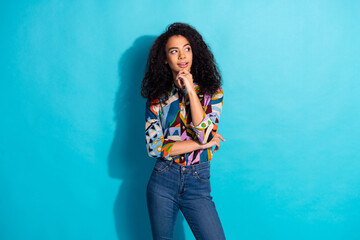 Photo of thoughtful lovely charming woman wear stylish print clothes look empty space isolated on...
