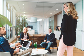 Relaxed and casual business meeting in office lounge