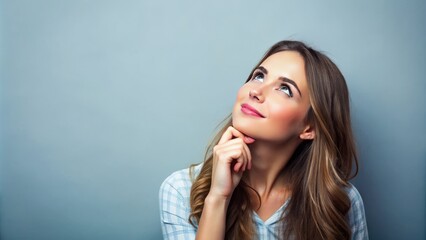 Her brow furrowed in concentration, the young woman's finger drummed a slow rhythm on her chin as she