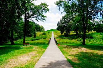Fototapeta premium Macon, Georgia, USA- 07 20 2024: The landscape of Ocmulgee Mounds National Historical Park