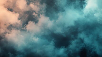 Obraz premium A blue and peach colored smoke cloud on a dark background.