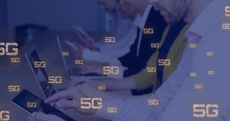 Image of icons and data processing over diverse business people using tablets