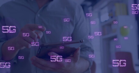 Image of 5g text and data processing over caucasian businessman using tablet