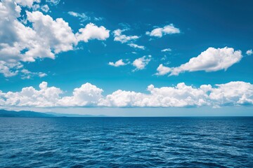 Obraz premium Beautiful nature view bright blue sky with white clouds background and soft oceans waves with a deep blue color on the sea , ai