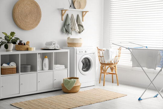 Washing machine, towels and detergents in laundry room