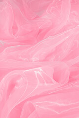 Fototapeta premium Beautiful pink tulle, closeup view of fabric