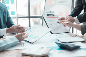 ​​Multi-national sales team meets with the director, young professionals discuss work problems, analyze financial statistics, share creative brainstorming solutions.