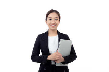 Portrait young asian businesswoman in suit celebrating success while holding a laptop isolated white background, business woman holding notebook expression with achievement and winning.