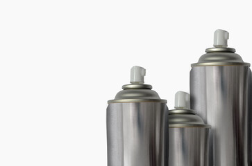 three tubes of silver spray paint with copy space for text