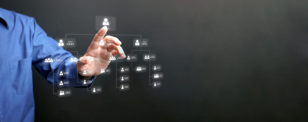 A man tapping on organization chart on virtual interface screen. Business process and workflow...