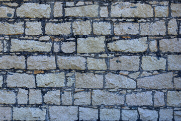 Abstract old brick block wall seamless pattern on grey background. Copy Space.