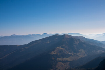 Obraz premium Panoramic view of mountain peak Goldeck seen from top of mount Latschur, Gailtal Alps, Carinthia, Austria, Europe. Peaceful tranquil atmosphere in wilderness in alpine summer. Hiking trail Wanderlust