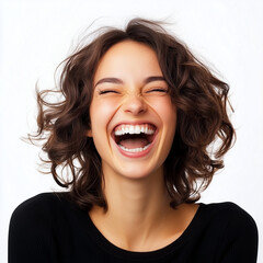 A cheerful woman with a big smile showing genuine joy and happiness as if celebrating or expressing excitement