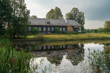 View of the Osipov-Wolf House Museum on the bank of the Factory Pond in the Trigorskoye Estate of...