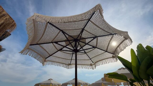 beach umbrella and sky background