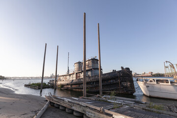 Old rusty abandoned ship vessel boat parked in Columbia River at North Portland, not being used for years. High quality picture for download.