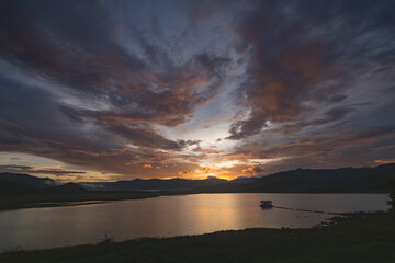Twilight Sky view over the mountains at Ban Khlong Bueng Reservoir, Prachuap Khiri Khan, Thailand