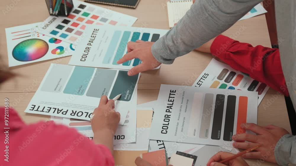 Aufkleber hand closeup of designer team brainstorming and choosing color for graphic design working or client 