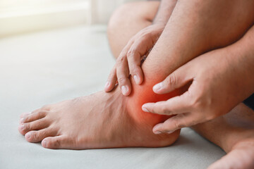 A man injured his ankle and it was swollen and red. Causes of pain include Ankle sprain, Gout,...