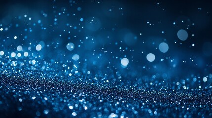deep blue background with scattered silver glitter