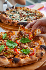 Lifestyle food with italian pizza naples hand tossed with fresh ingredients and cooler drinks.