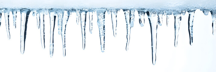 Icicles hanging isolated on white background