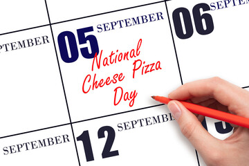 September 5. Hand writing text National Cheese Pizza Day on calendar date. Save the date.
