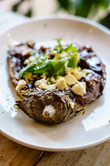 Grilled eggplant with curry, feta format and all black, Sant Cugat del Vallès, (Vallès Occidental), Catalonia, Spain