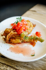 Zucchini flower with anchovy and mozzarella cheese, Sant Cugat del Vallès, (Vallès Occidental), Catalonia, Spain
