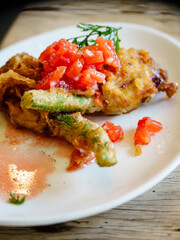 Zucchini flower with anchovy and mozzarella cheese, Sant Cugat del Vallès, (Vallès Occidental), Catalonia, Spain